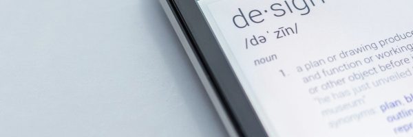 Ipad screen with search results for the definition of the word design.