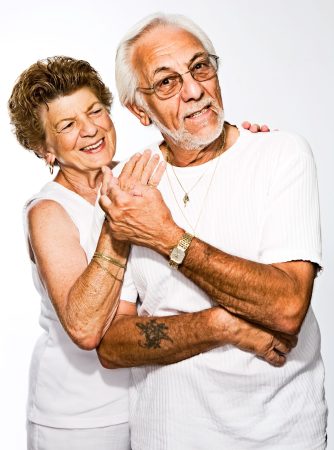 Older couple in white t-shirts